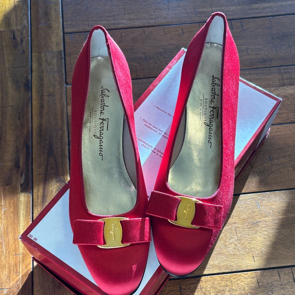 Salvatore Ferragamo Red Pumps with Gold Accent